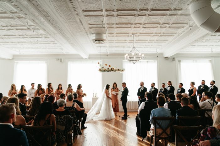 Hannah and Tyler's fall wedding at Upper East in Kenosha, WI. Photographed by Everly Collective